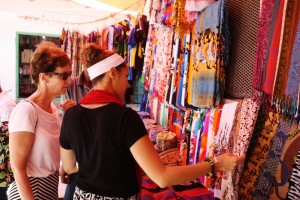 Shopping for traditional fabrics at the market!